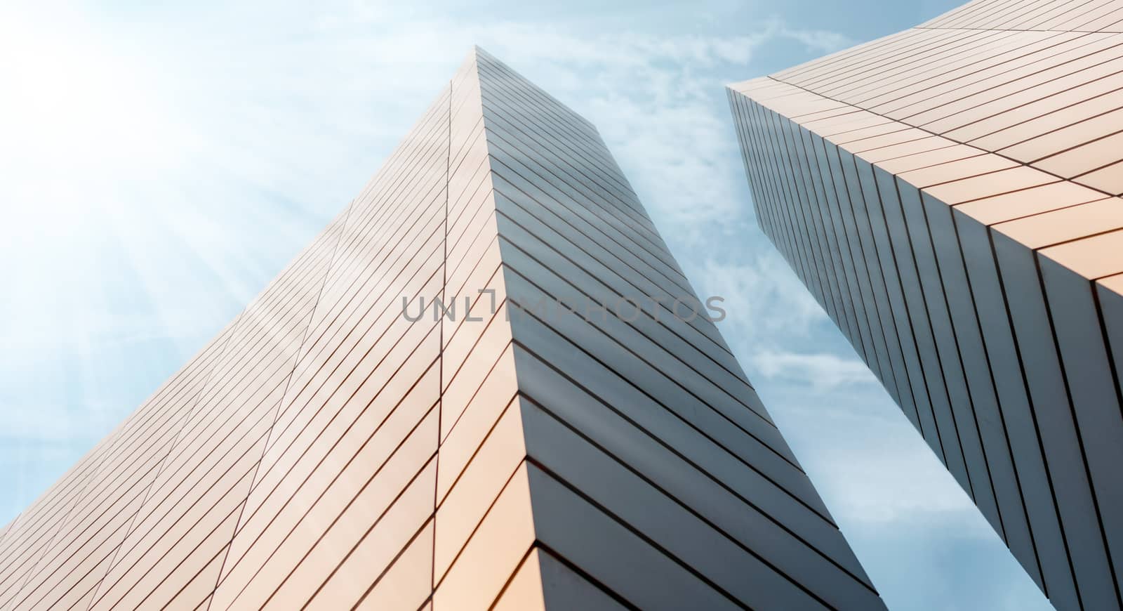 wall of a modern building on a background of blue sky abstract architectural background