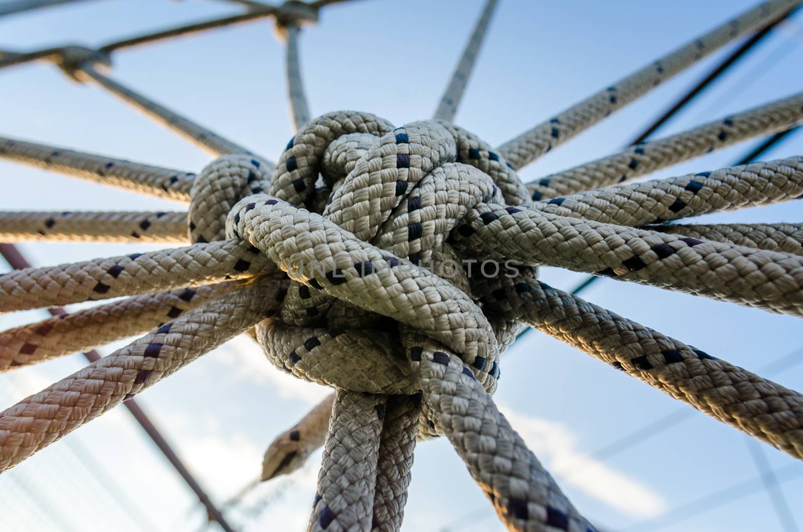 many ropes and one big knot close up