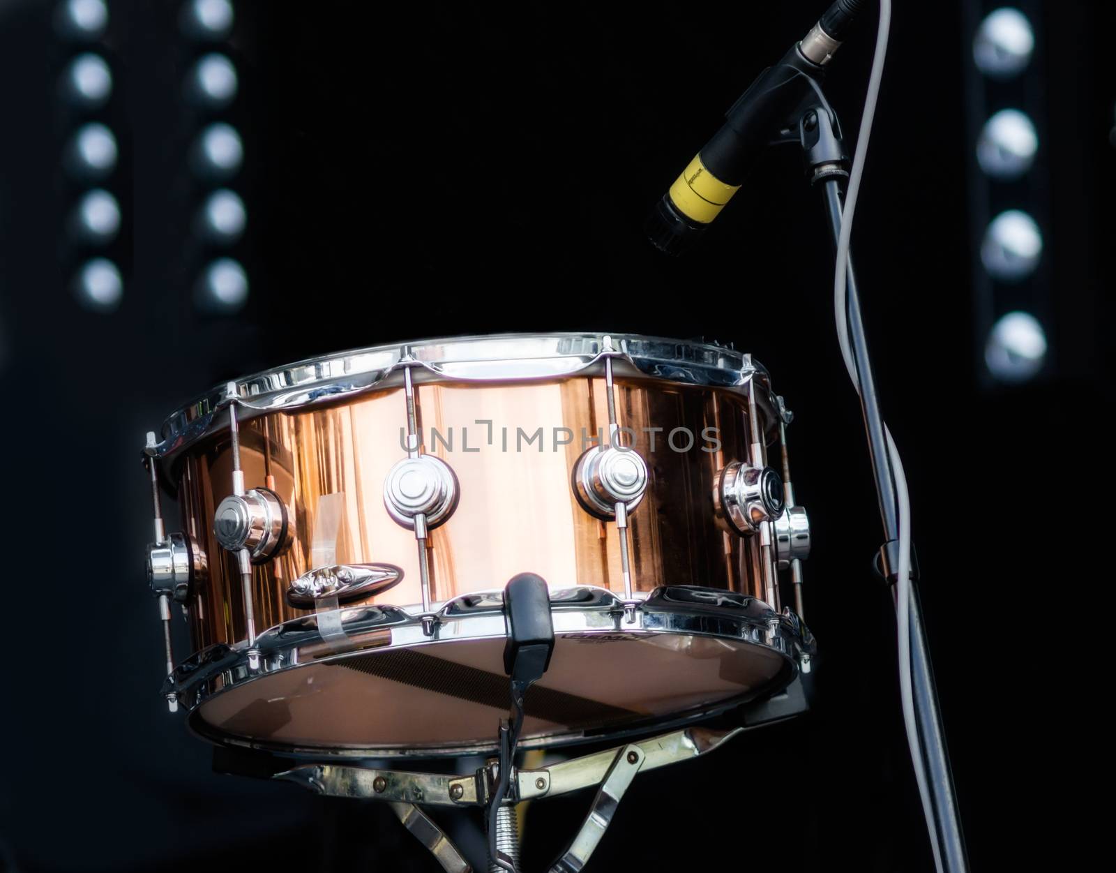 drum with microphone on stage closeup