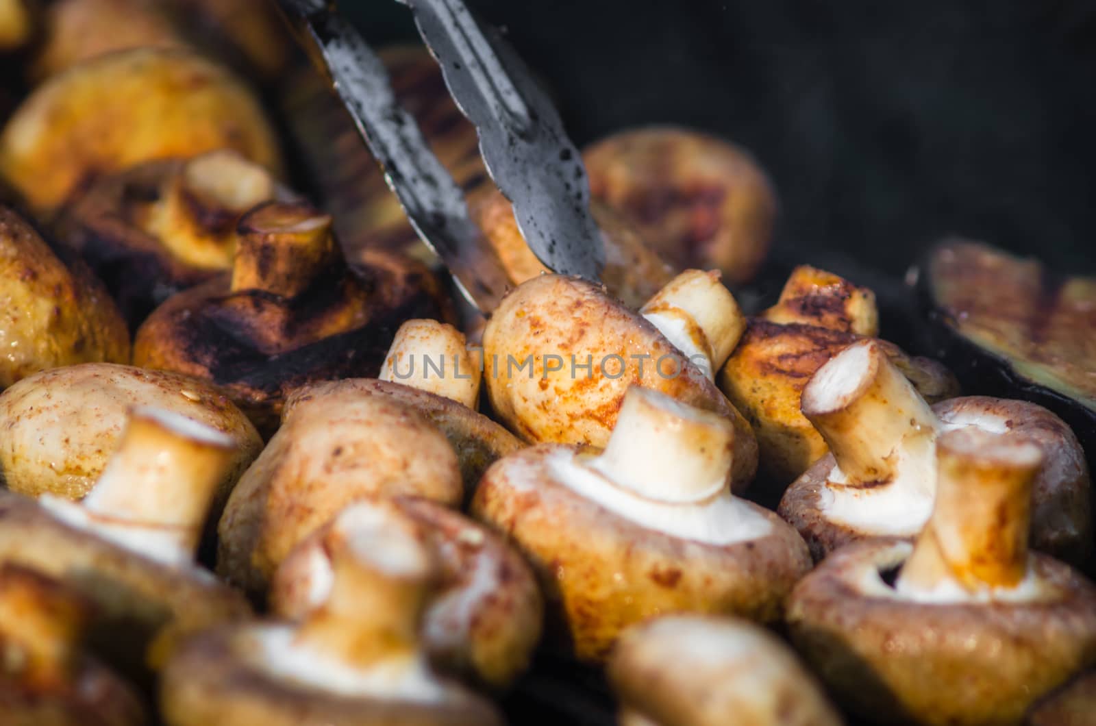 grilled champignon mushrooms close up