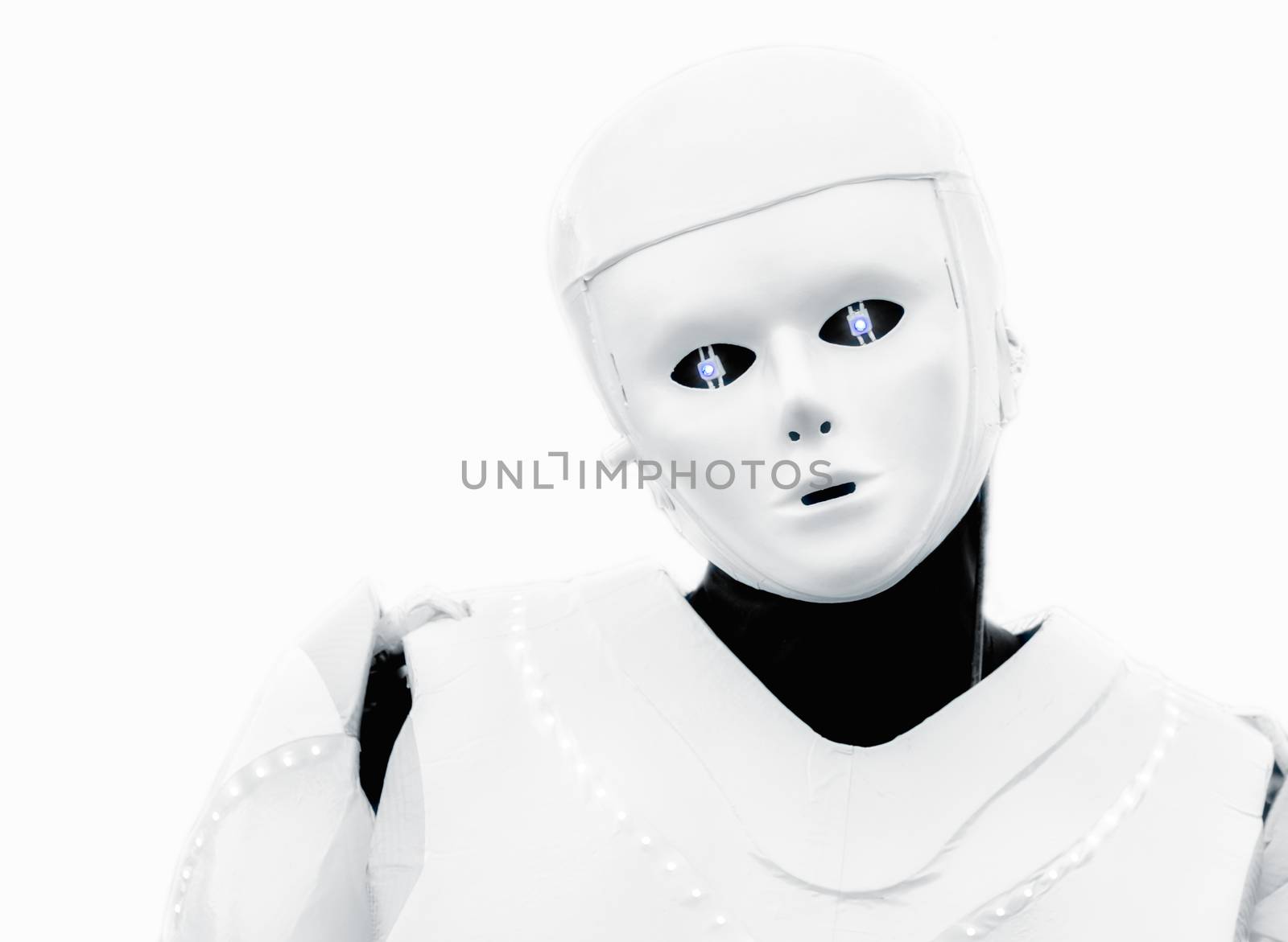 portrait of a man in a robot suit with blue eyes isolated on a white background close up