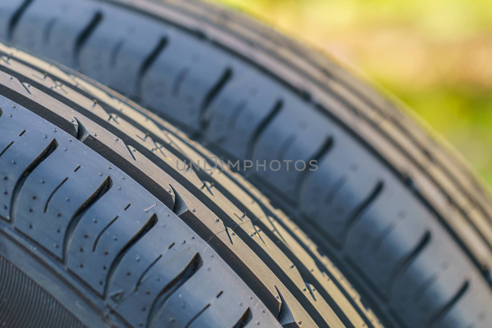 car tire, tread design with selective focus, close-up