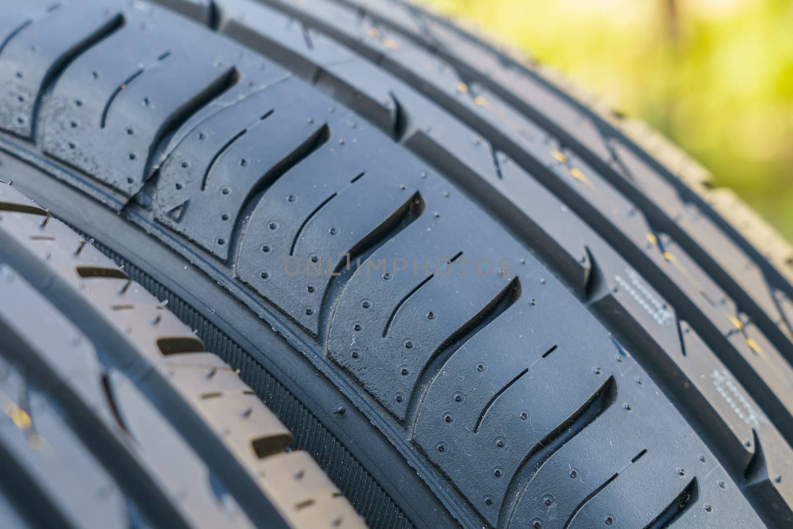 car tire, tread design with selective focus by VADIM