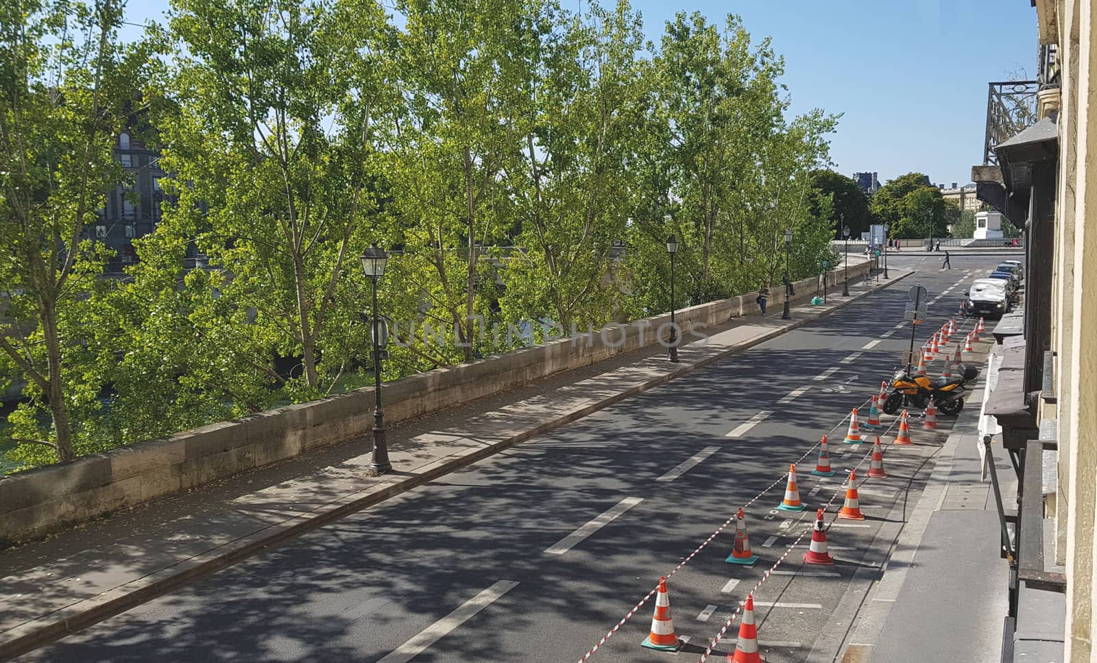 Paris embankment with trees and traffic cones