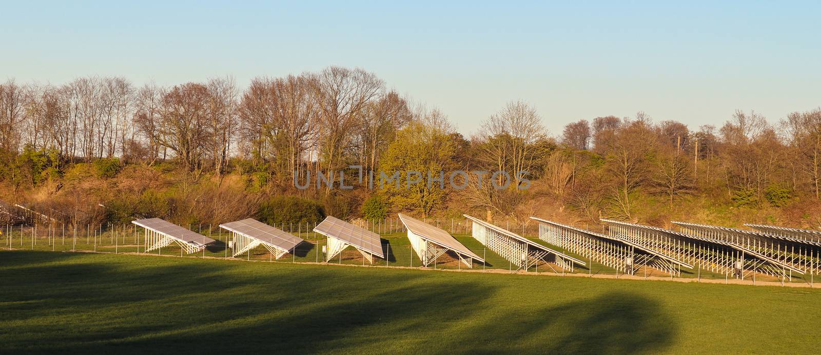 Generating clean energy with solar modules in a big park in nort by MP_foto71