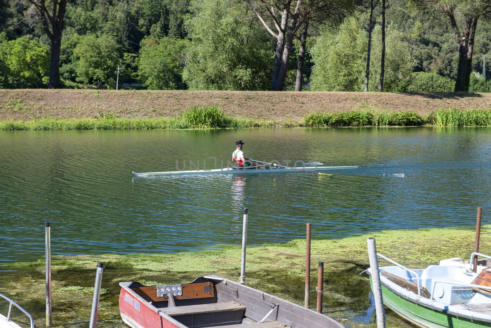 piediluco,italy june 22 2020:velino river which opens onto piediluco lake with rowing vests