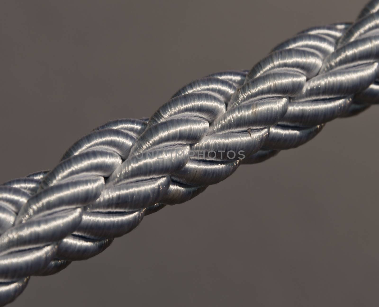 Silver Braided Rope on a grey background