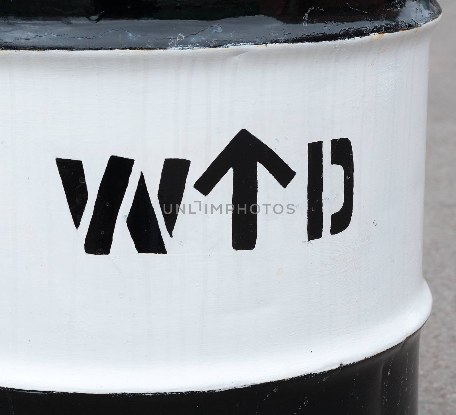 War Department sign on an oil drum