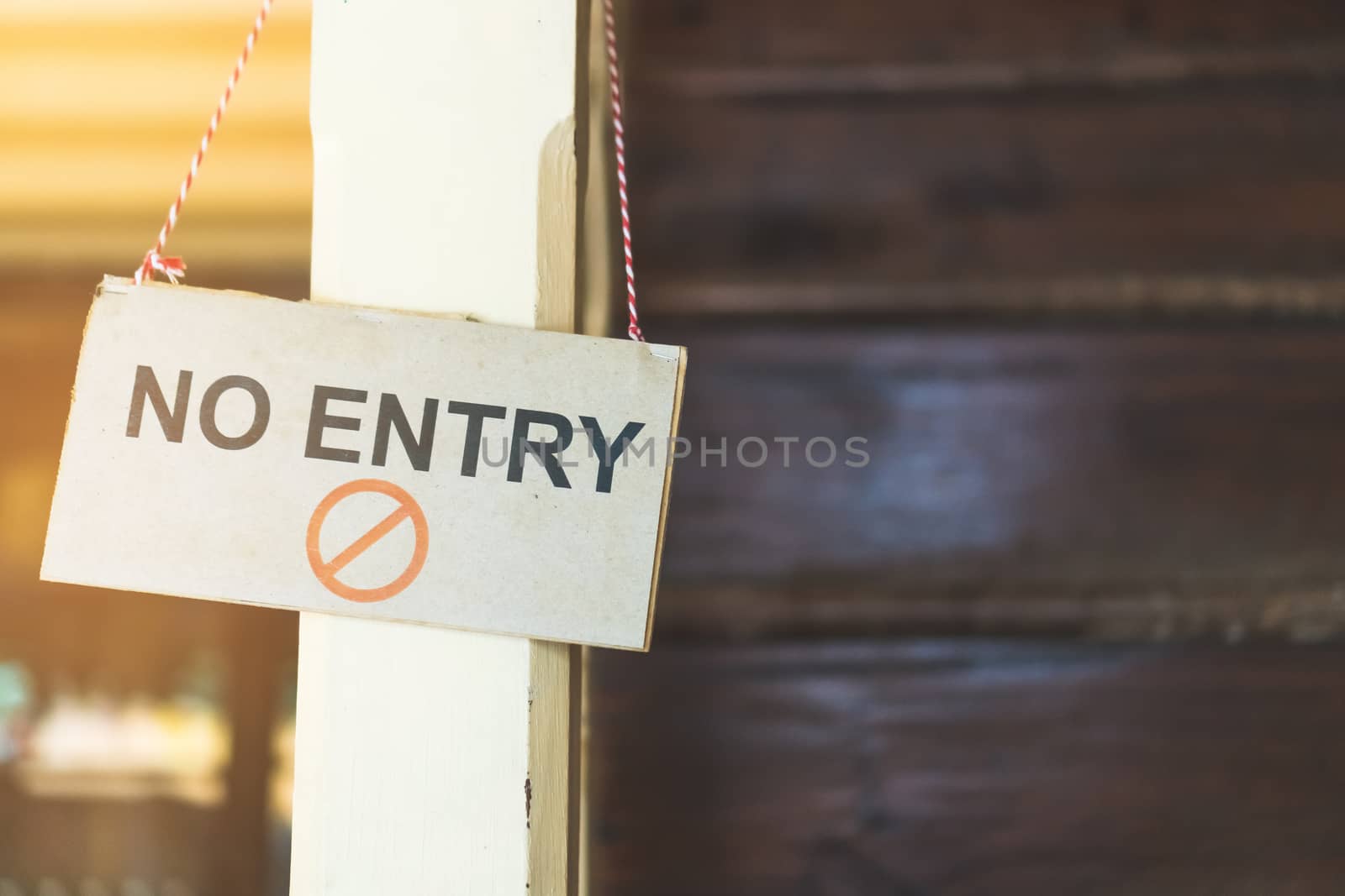No entry sigh hanging on stair background.