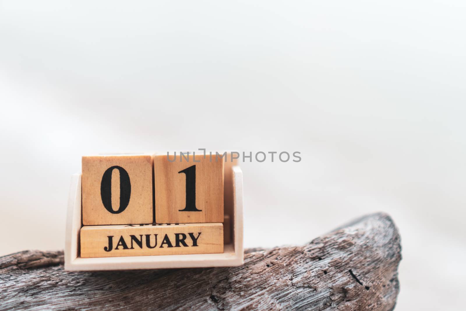 Wood brick block show date and month calendar of 1st January or New year day. Celebration and holiday long weekend season concept.