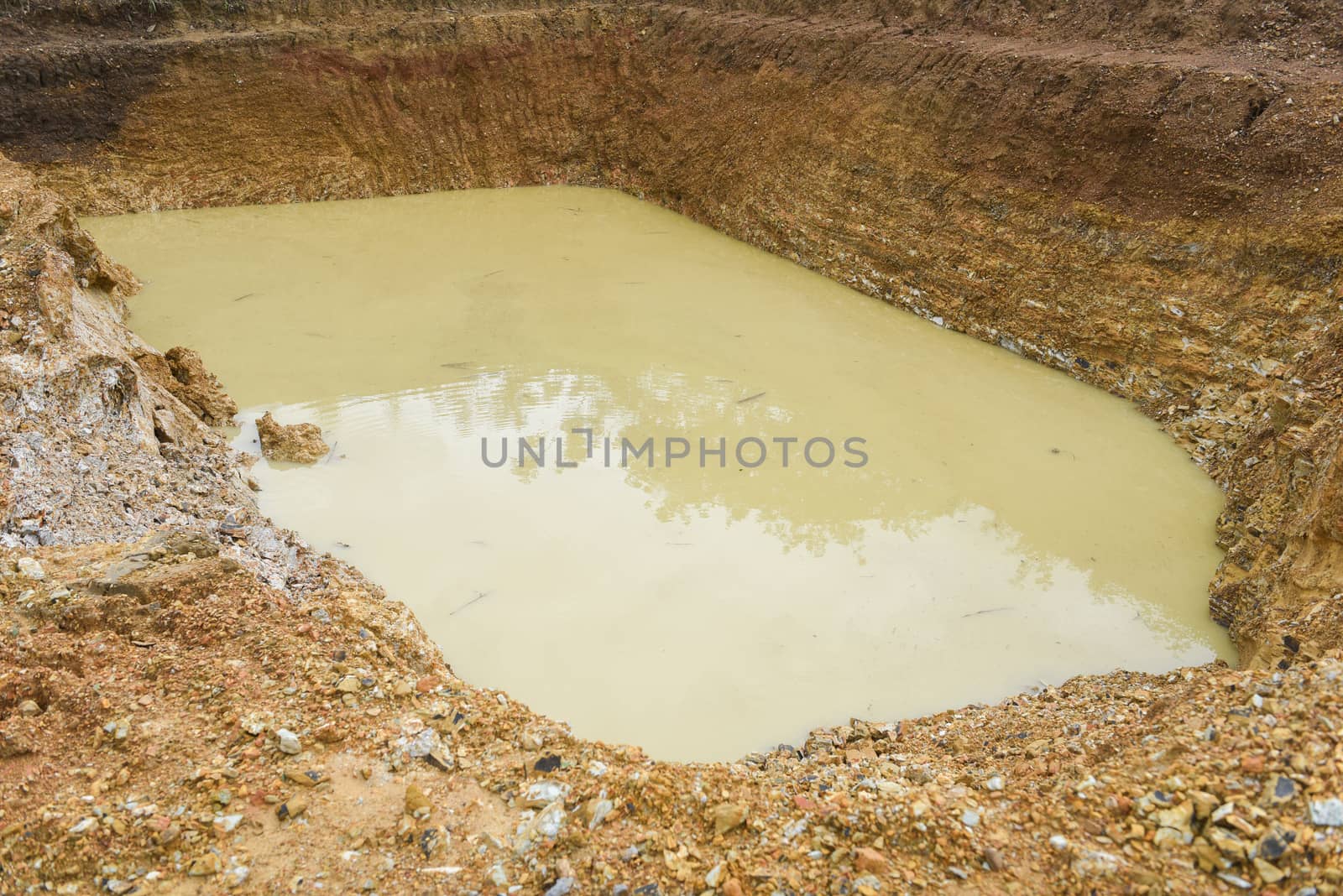 Mud pond in arid season / drill pond water