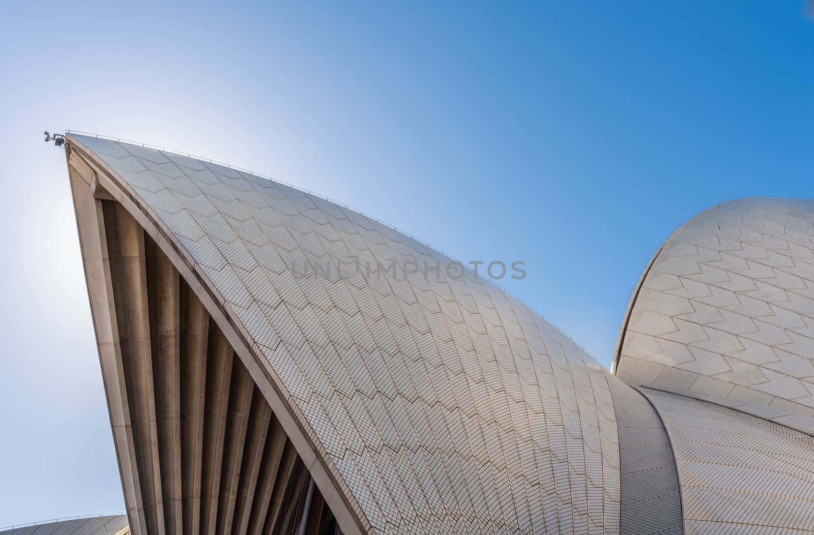 Sydney, Australia - February 11, 2019: Detail of white roof structure of Sydney Opera House against deep blue sky. 7 of 12.