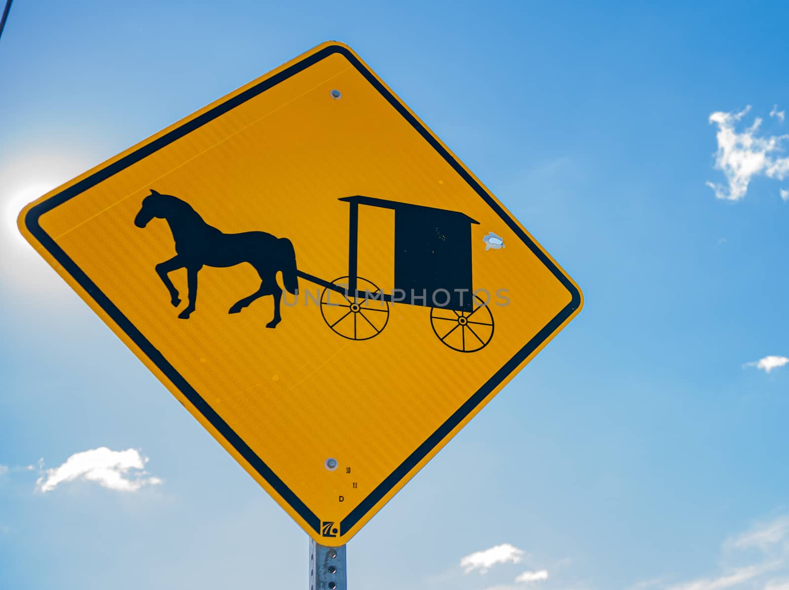 Amish traditional horse and buggy road sign in Lancaster County Pennsylvania, USA.