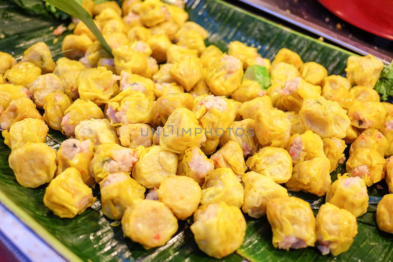 Chinese Steamed Dumpling on banana leaf in Fresh maket 