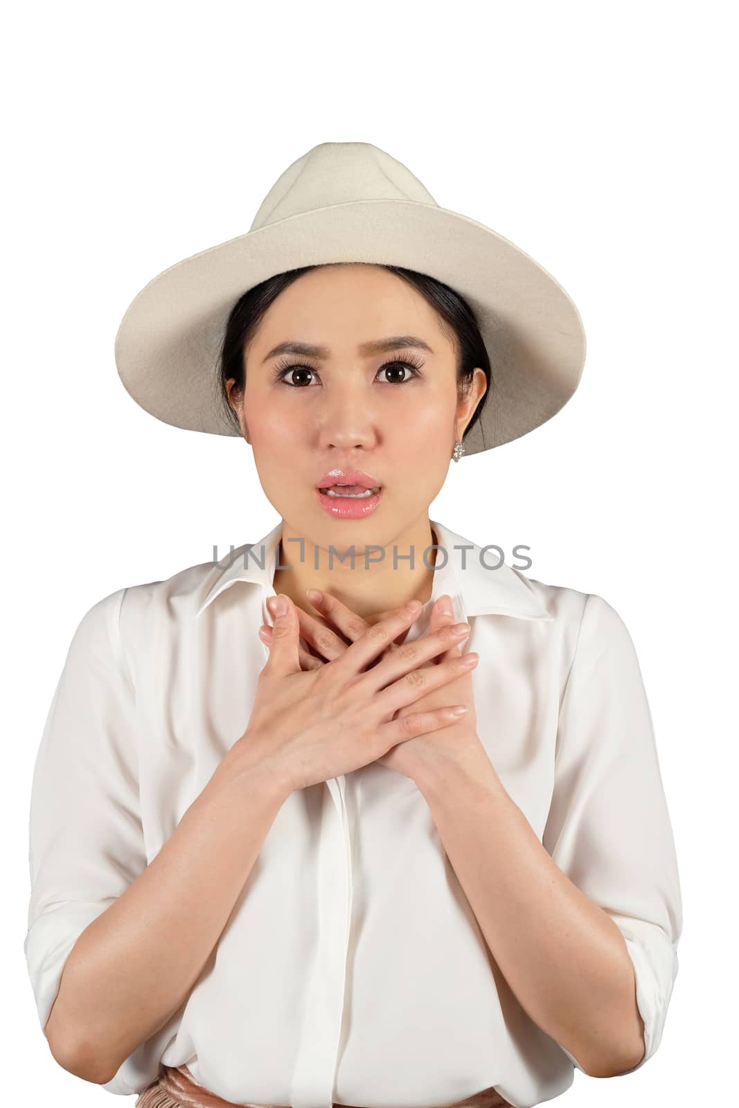 Shocked woman wearing stylish hat looking at camera and white background with clipping path