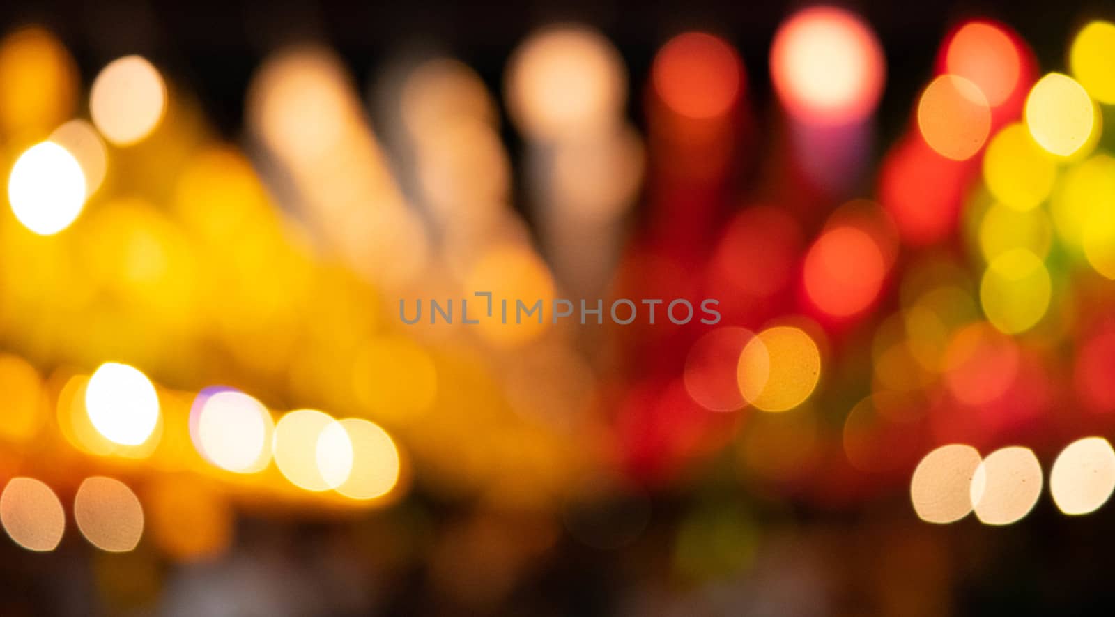 Abstract bokeh background of light from Thai lanna lantern at night.  Concepts of celebration in Yi Peng Festival. by TEERASAK