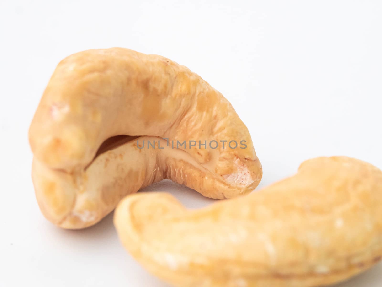 Close-up of cashew nut isolated on white background.