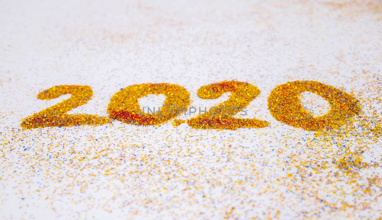 New Year 2020 is coming concept, The yellow glitter showing 2020 by TEERASAK