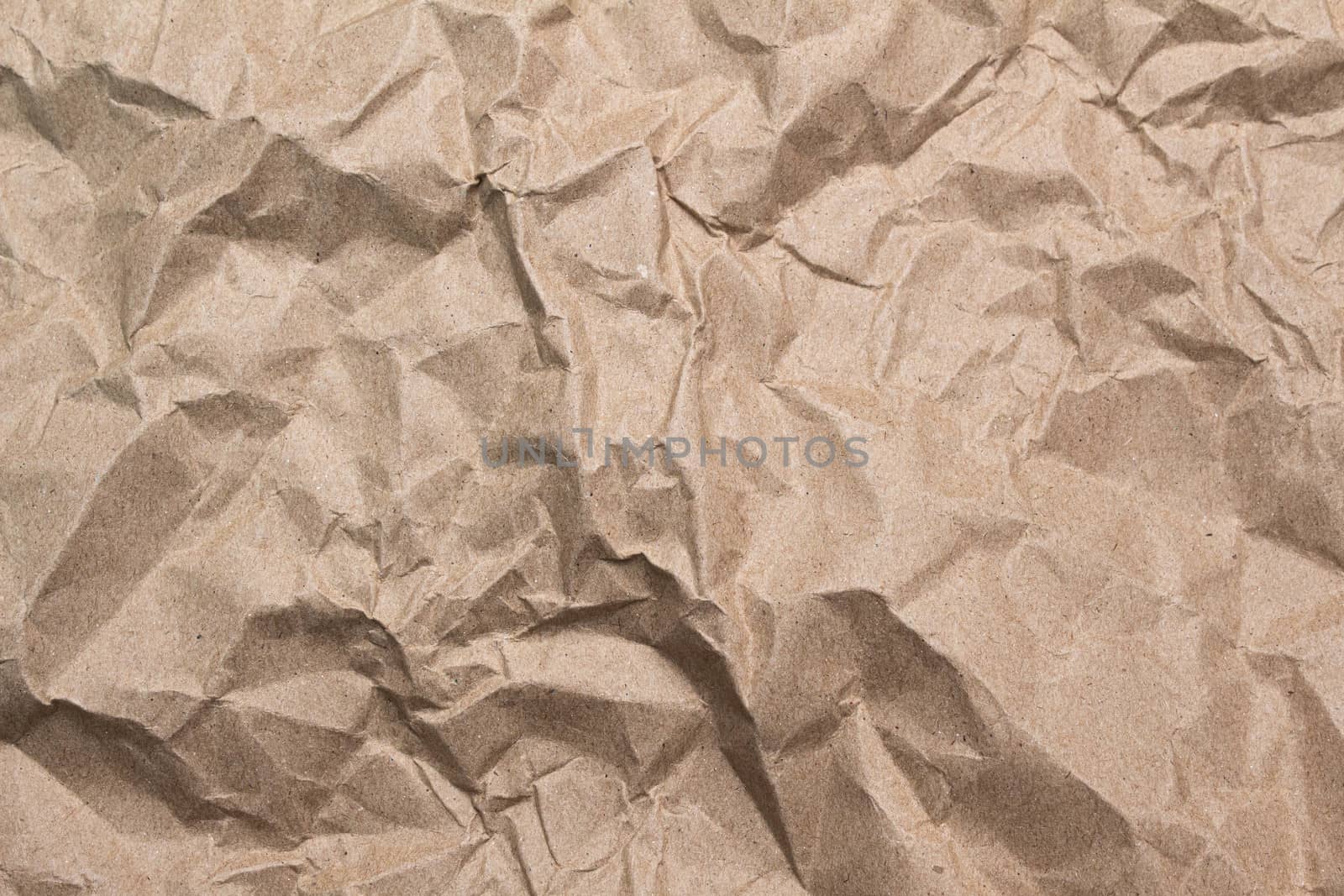 Close up of brown crumpled paper texture background.