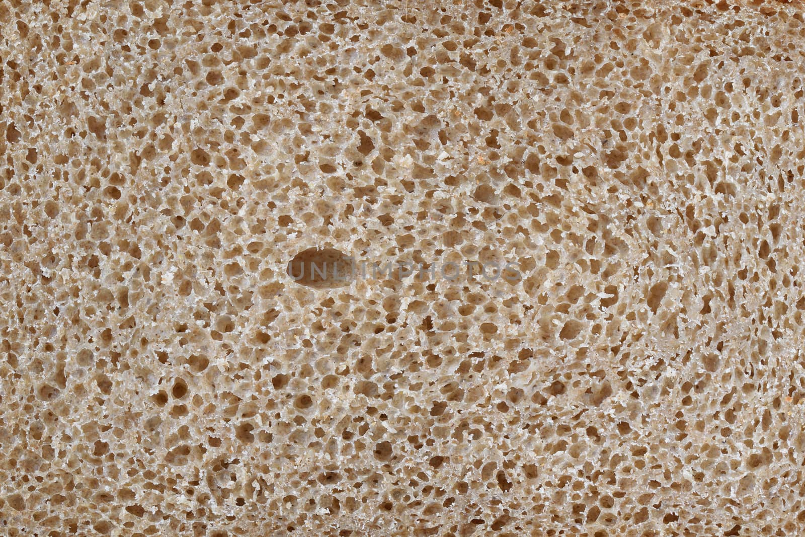 Structure of bread brown close up.