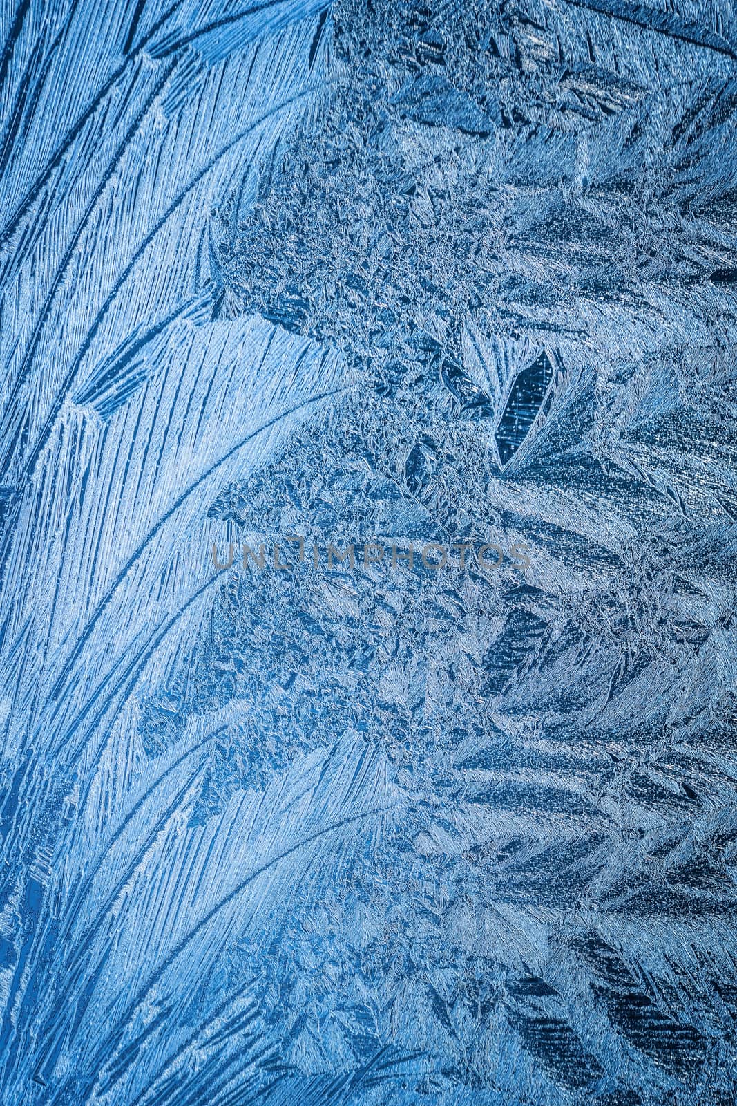 Frosty natural pattern on winter window