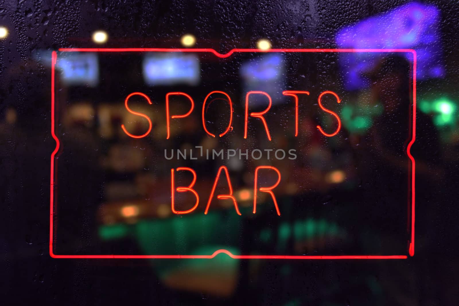 Vintage Neon Sports Bar Sign, Rainy Window Blur Image