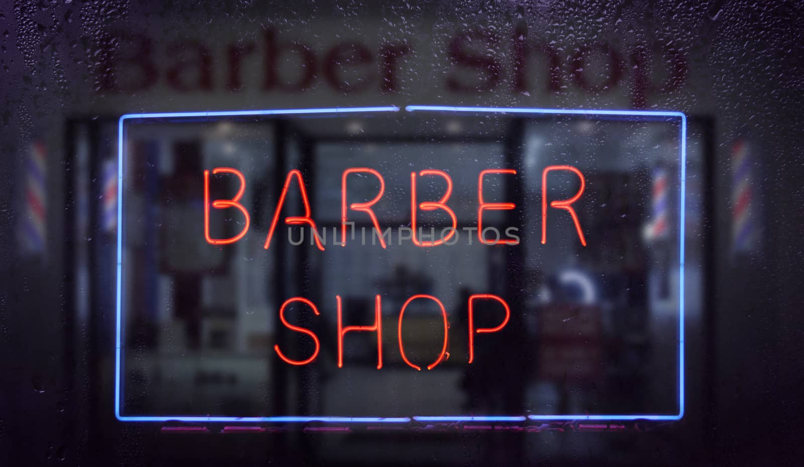 Vintage Neon Barber Shop Sign in Rainy Window