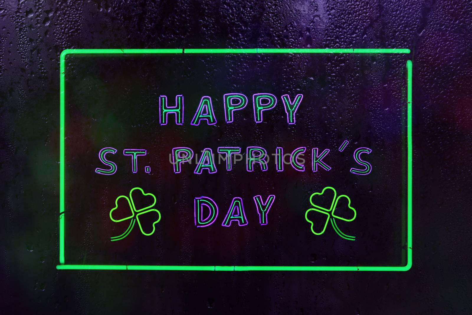 St. Patrick's Day Neon Sign in Rainy Window