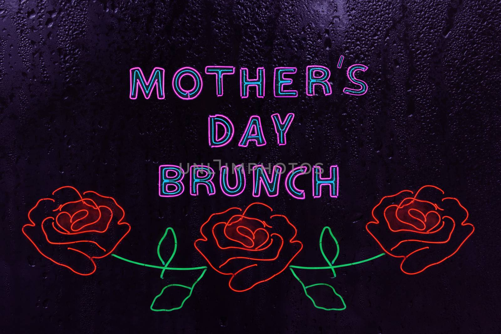Neon Mother's Day Brunch Sign in Rainy Window