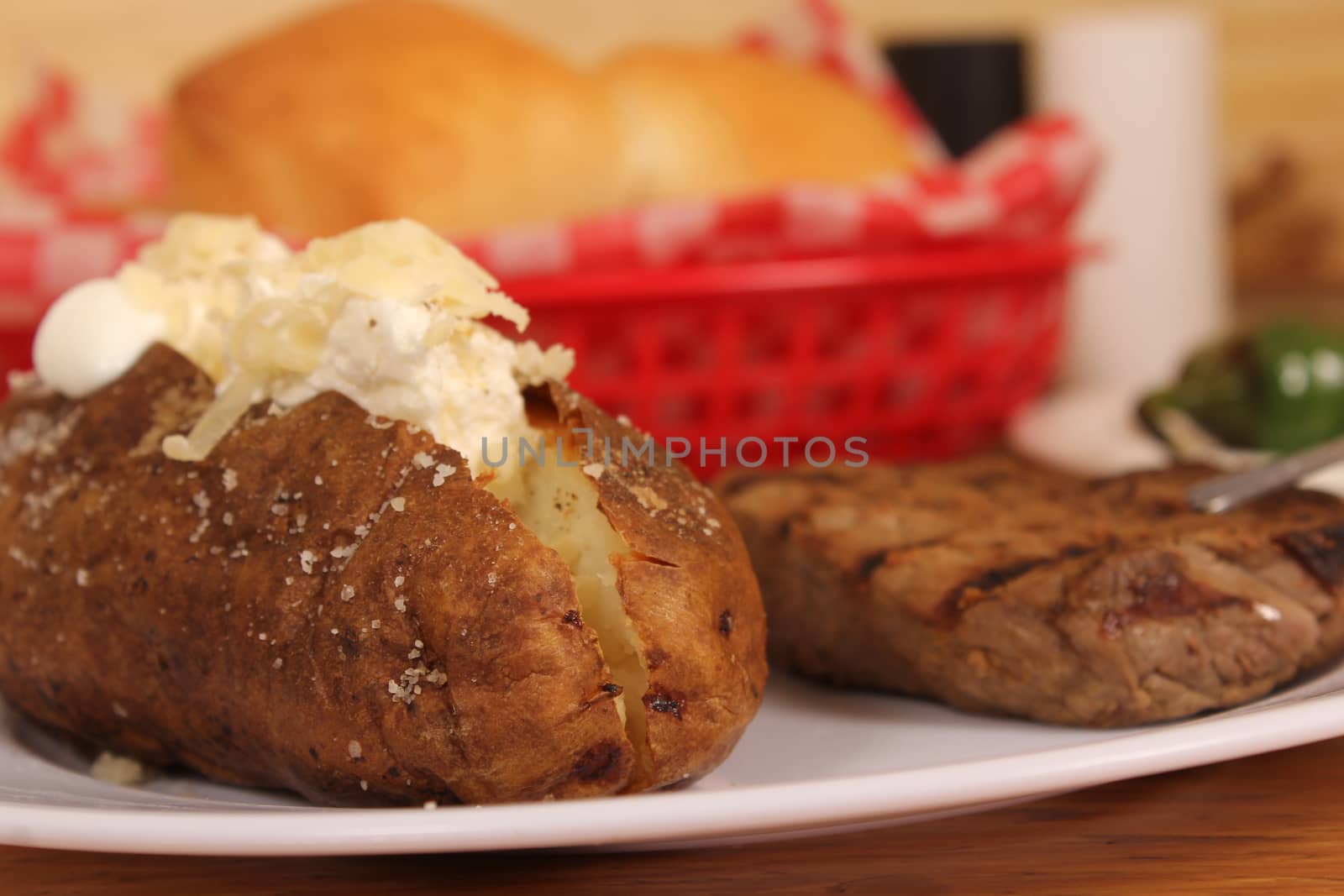 Sirloin Steak With Baked Potato and fresh rolls by Marti157900
