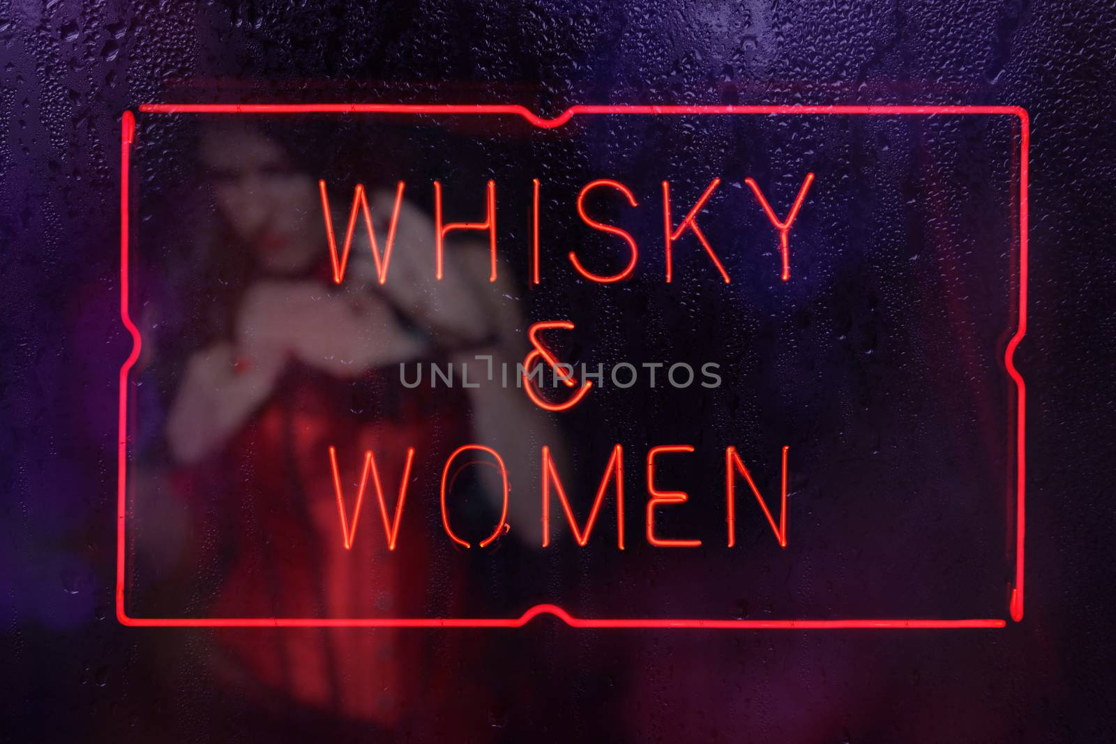 Neon Whisky and Women Sign in Rainy Window by Marti157900