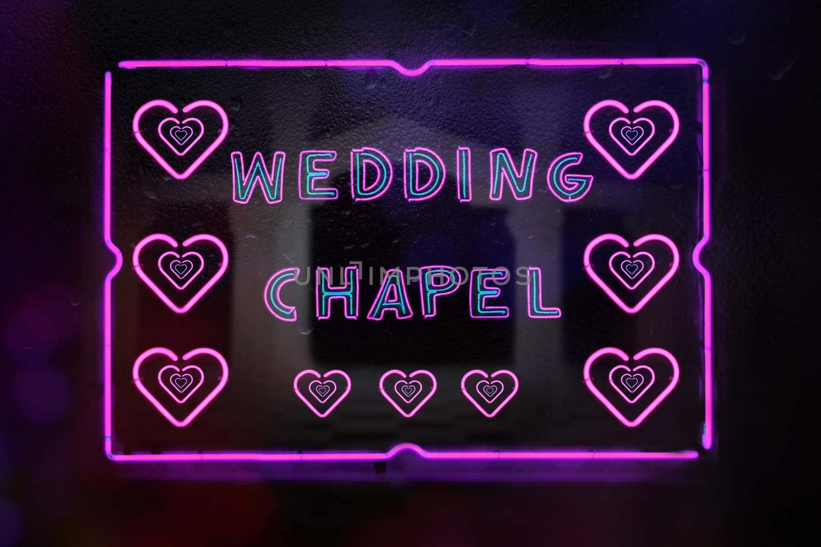Neon Wedding Chapel Sign in Rainy Window Photo Composite