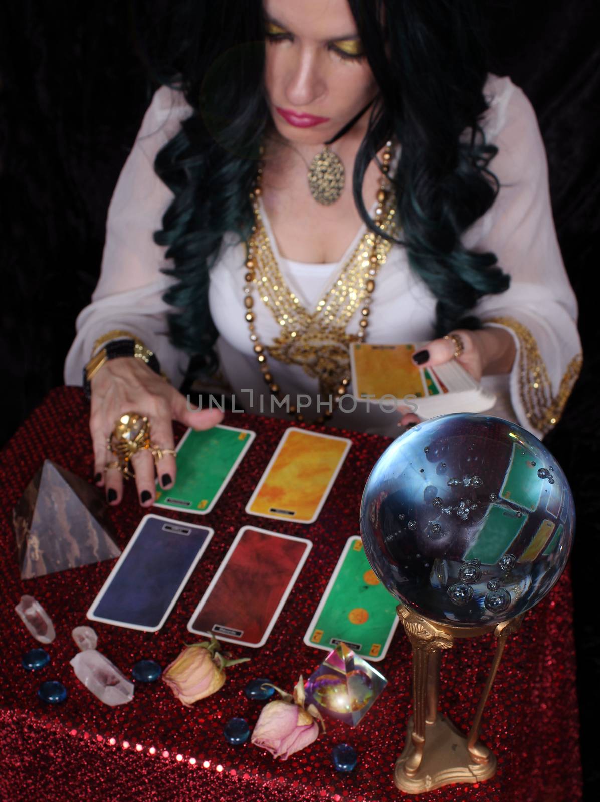 Psychic with green hair  Crystal Ball. and tarot cards