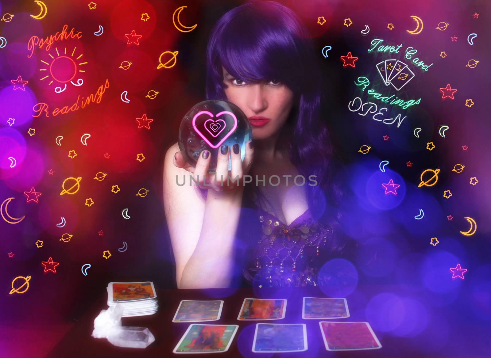 Psychic Tarot Card Reader with Purple hair and Crystal Ball. Neon Lights in background with Bokeh Effect