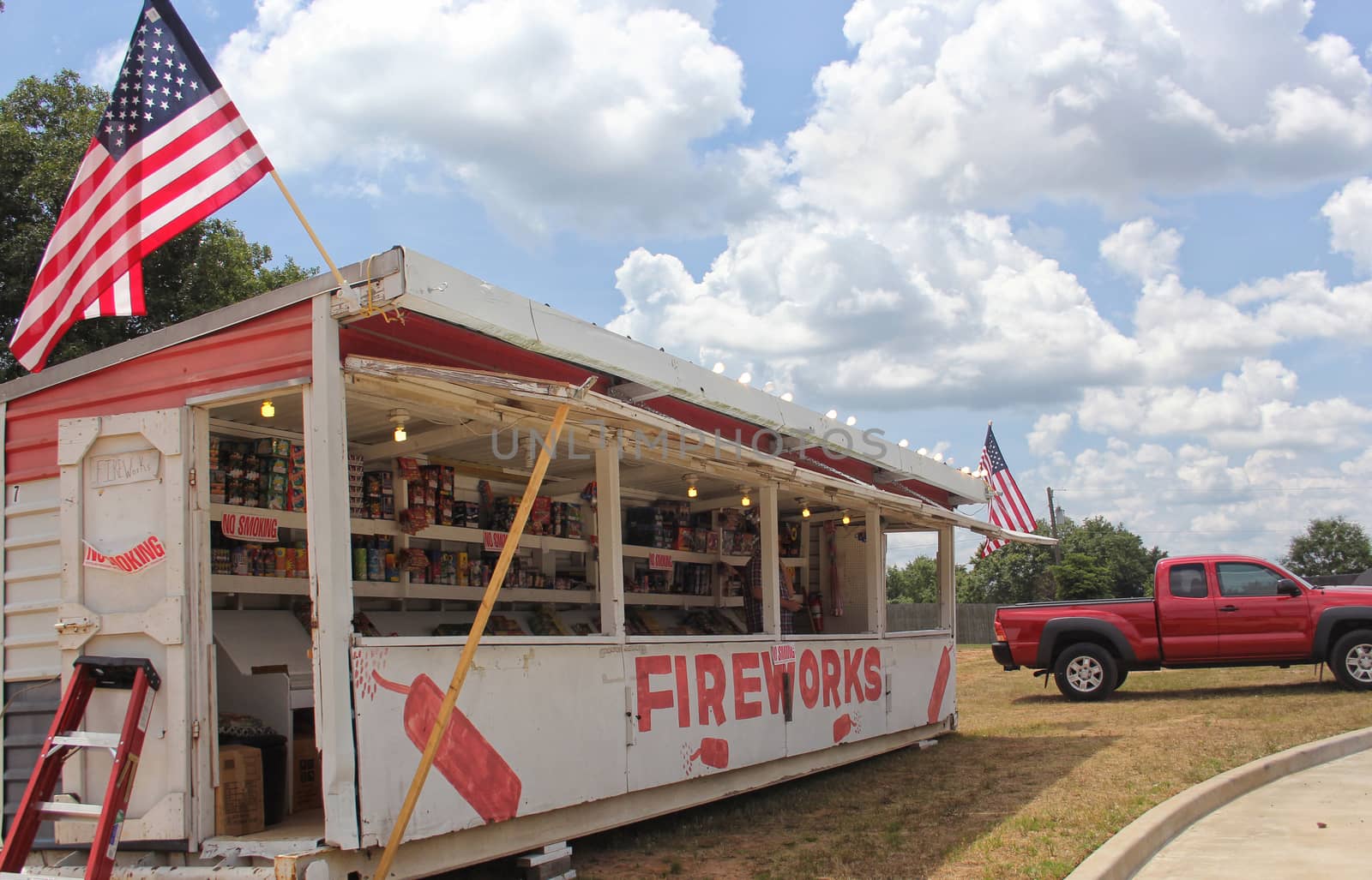 Fireworks Stand and American Flags by Marti157900