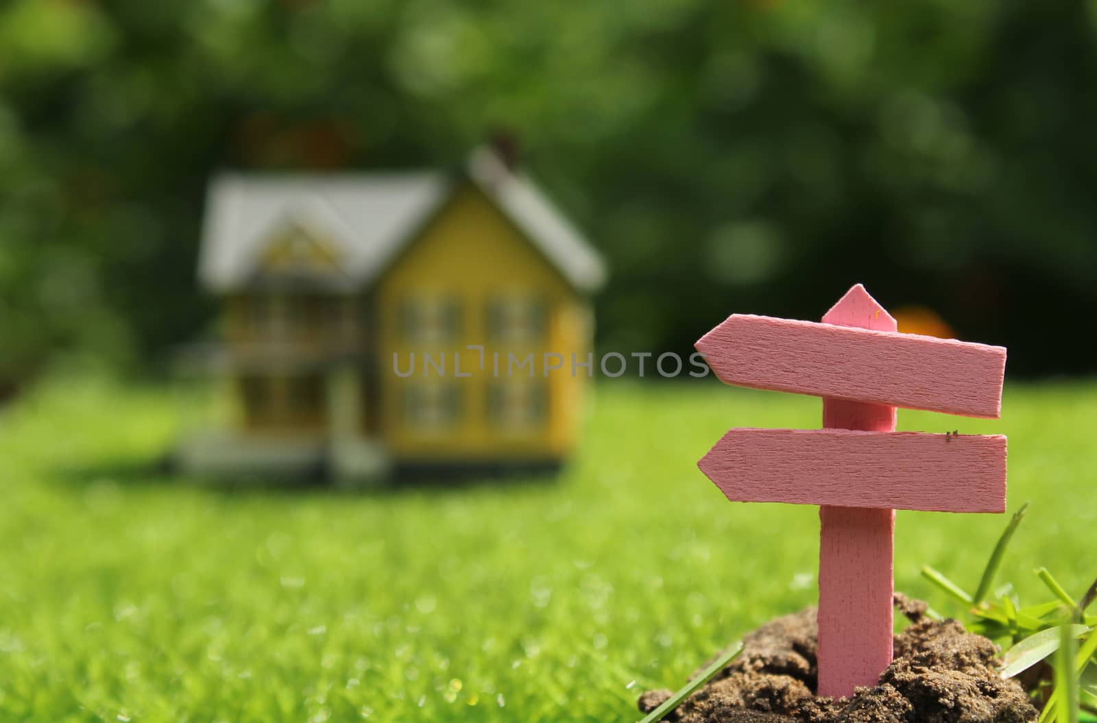 Rustic Signboard in Rural  Outdoor Area, Blurred Farmhouse in background 