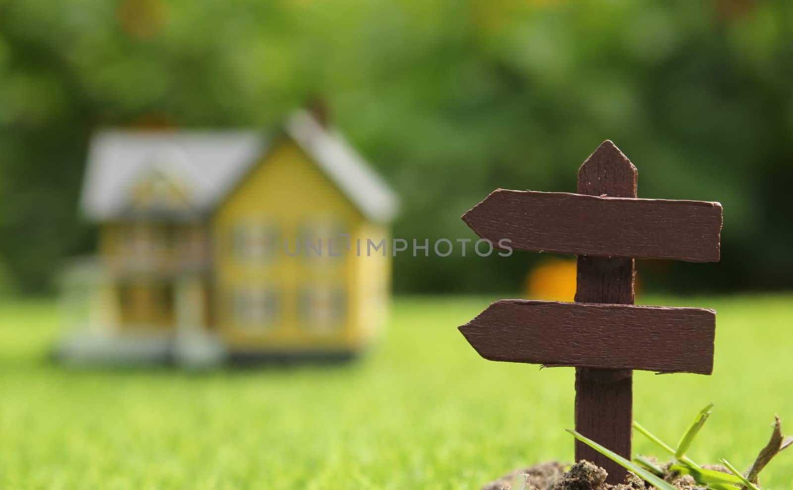Rustic Signboard in Rural  Outdoor Area, Blurred Farmhouse in background