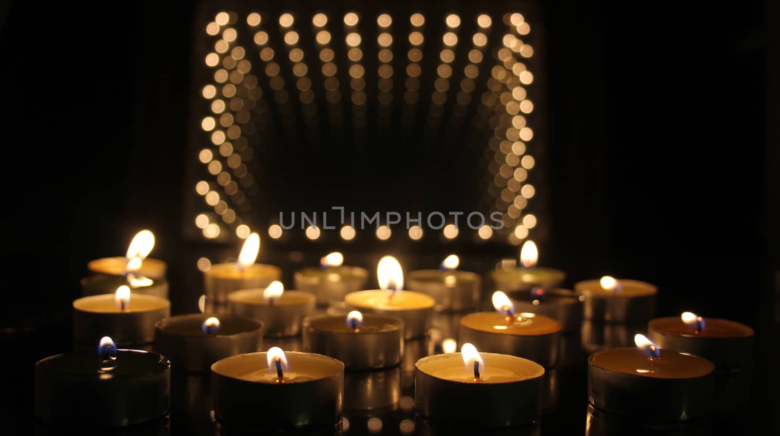 Candles on Black Background With Bokeh