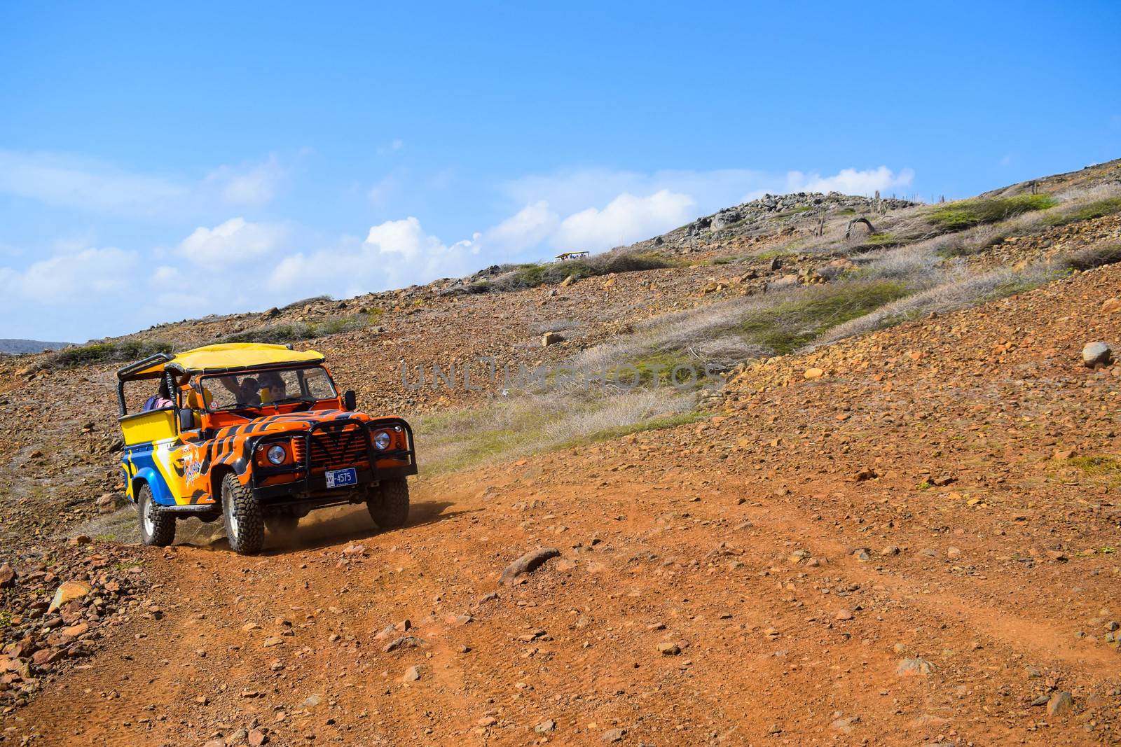 Arikok Natural Park on the island of Aruba in the Caribbean Sea with deserts and ocean waves on the rocky coast