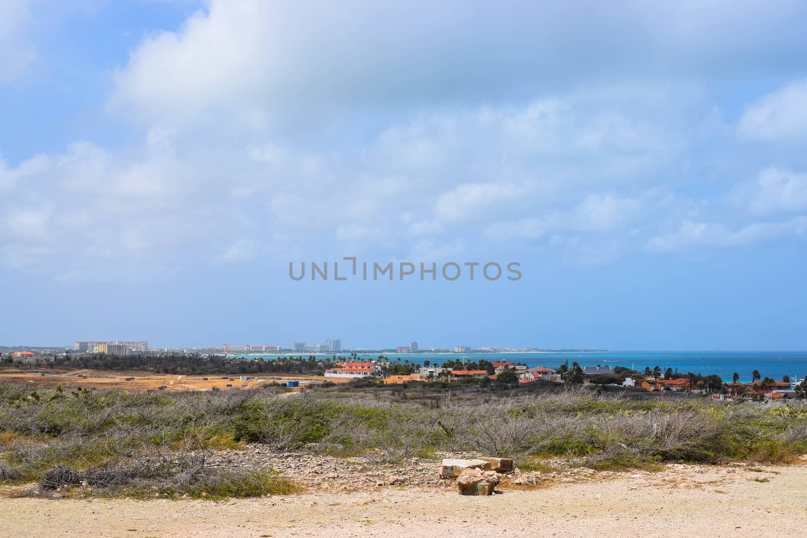 Arikok Natural Park on the island of Aruba in the Caribbean Sea with deserts and ocean waves on the rocky coast