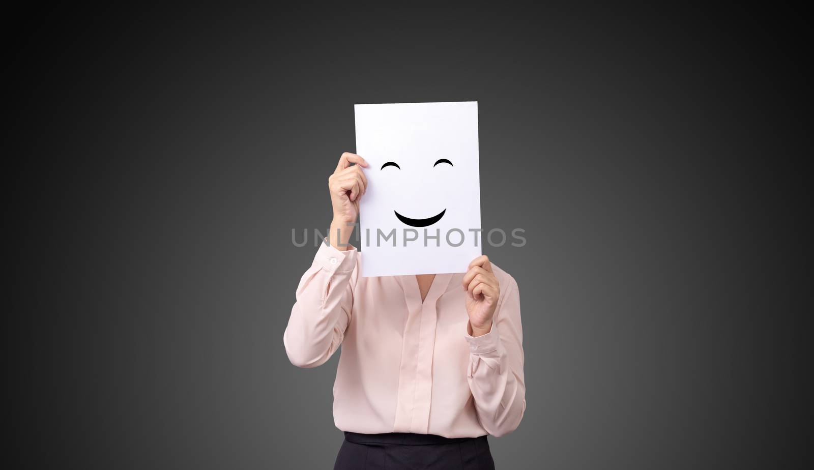 businesswoman holding a card with drawing facial expressions illustrations emotion feelings face on white paper by asiandelight