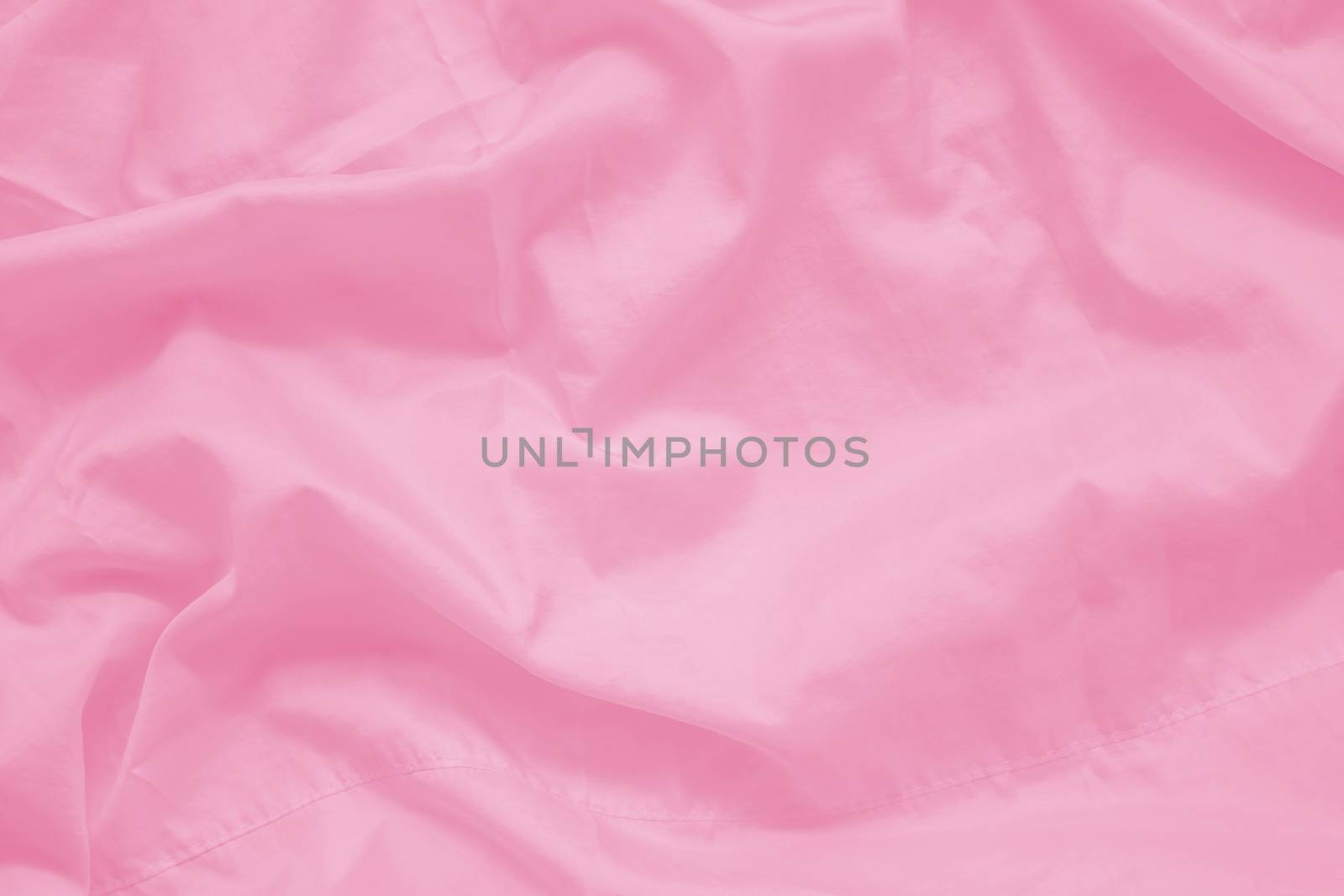 abstract wrinkled sweet pink color fabric cloth texture with fabric seam from yarn for background by asiandelight