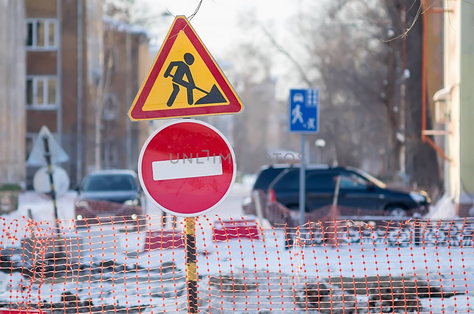 Closeup traffic stop sign, detour, repair, reconstruction of the road in the city