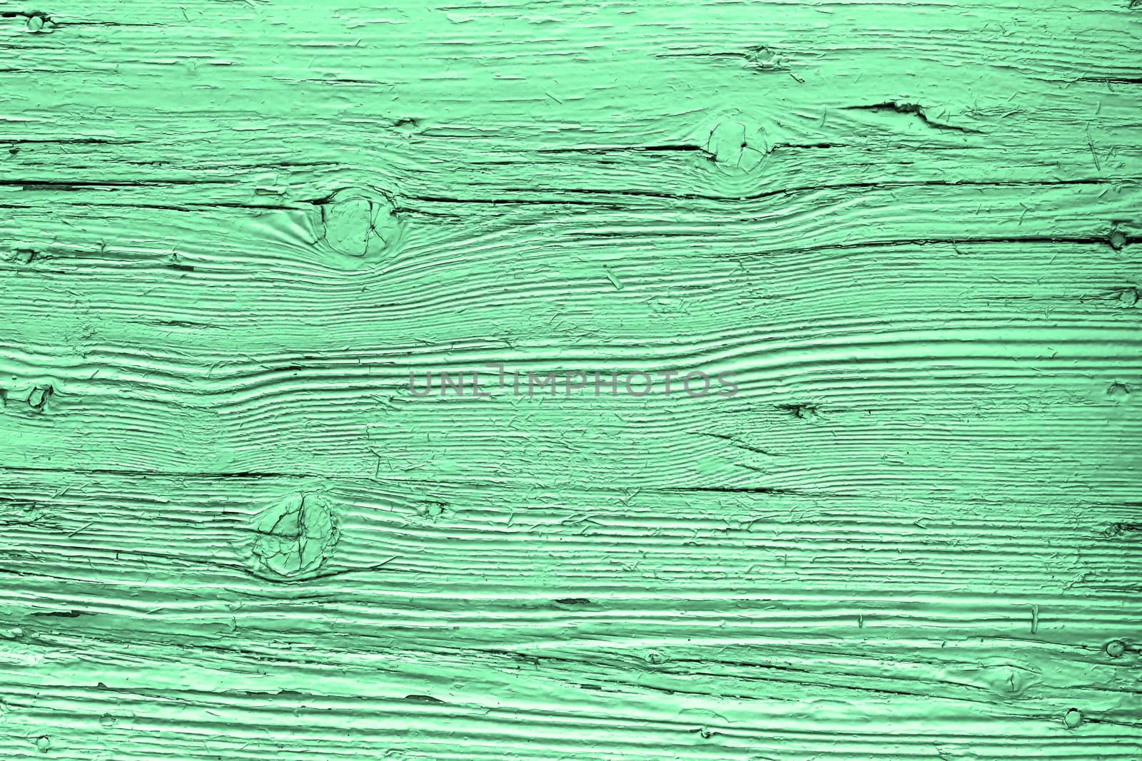 Light green wood texture with natural patterns background