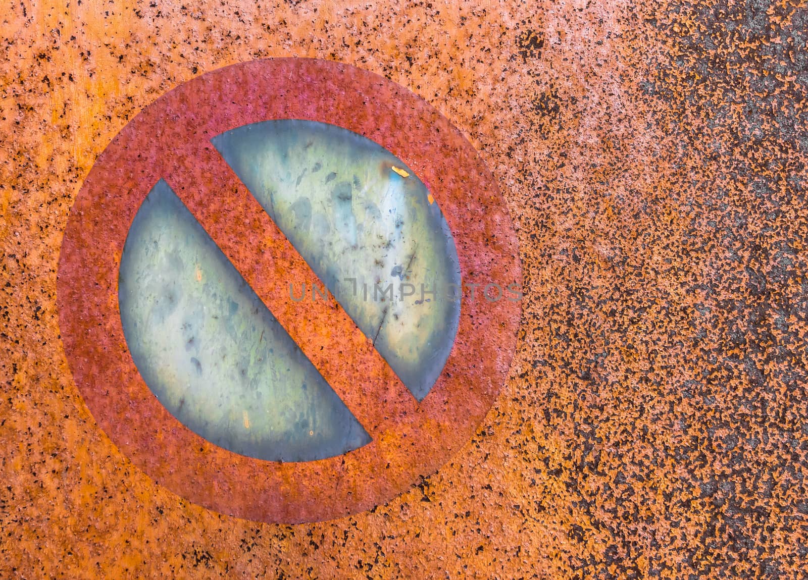 Old road sign on rusted background