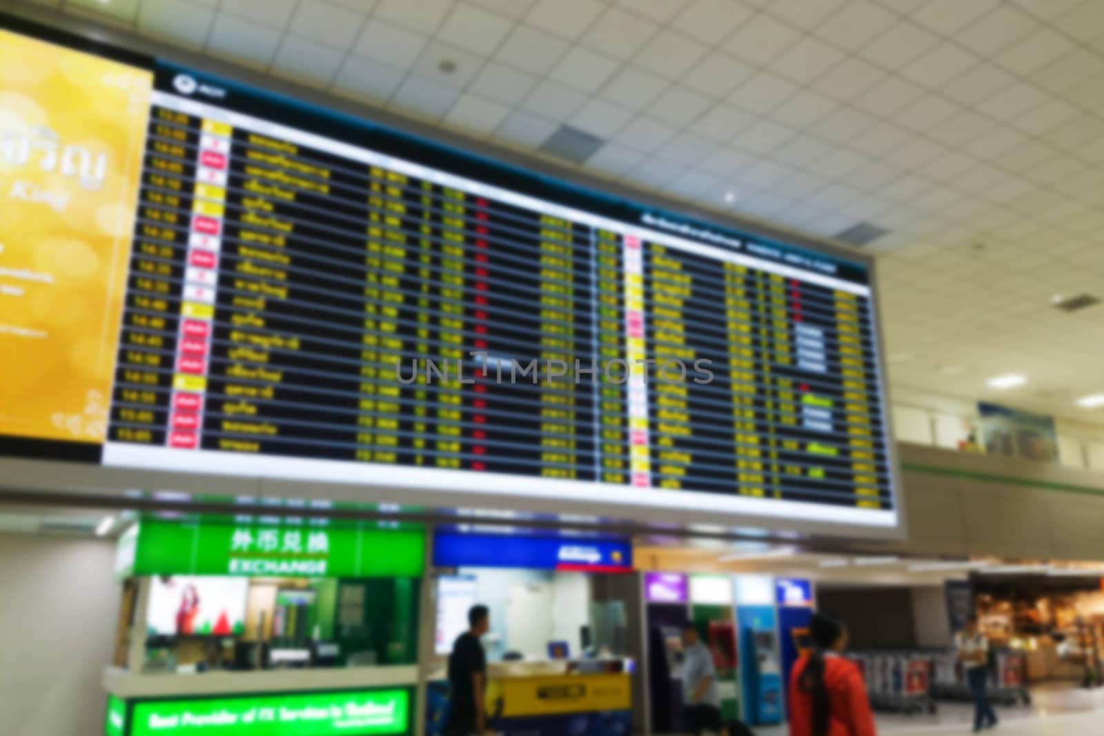 abstract blur timetable schedule digital screen board at the airport terminal for background. travel concept