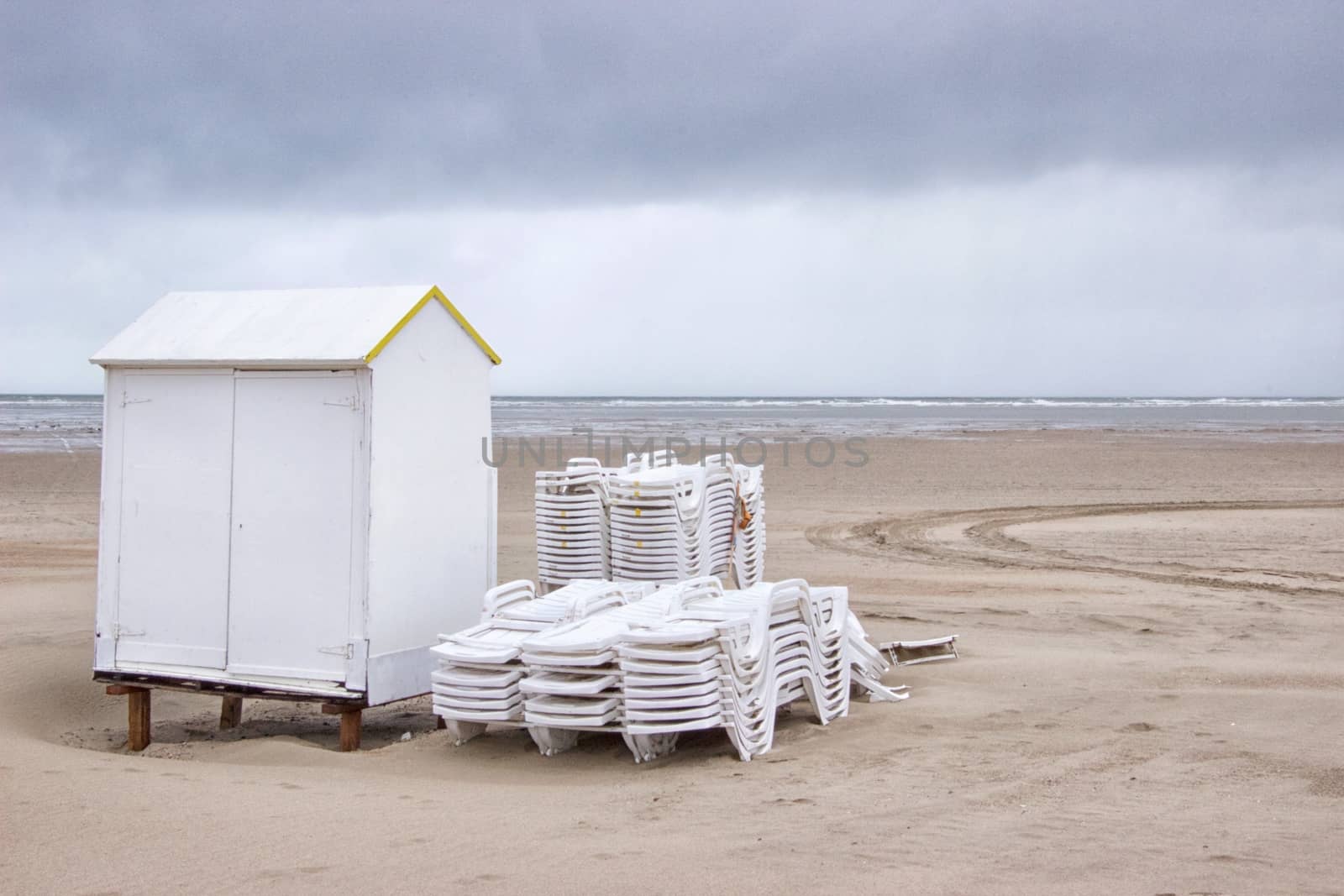 White cabins on a beach in winter