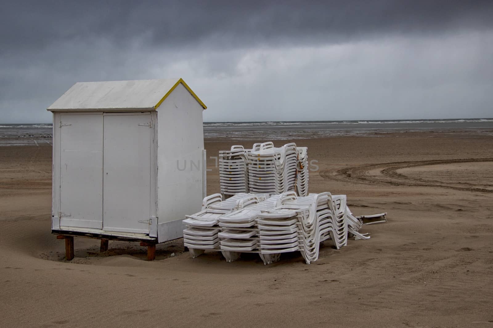 White cabins on a beach in winter