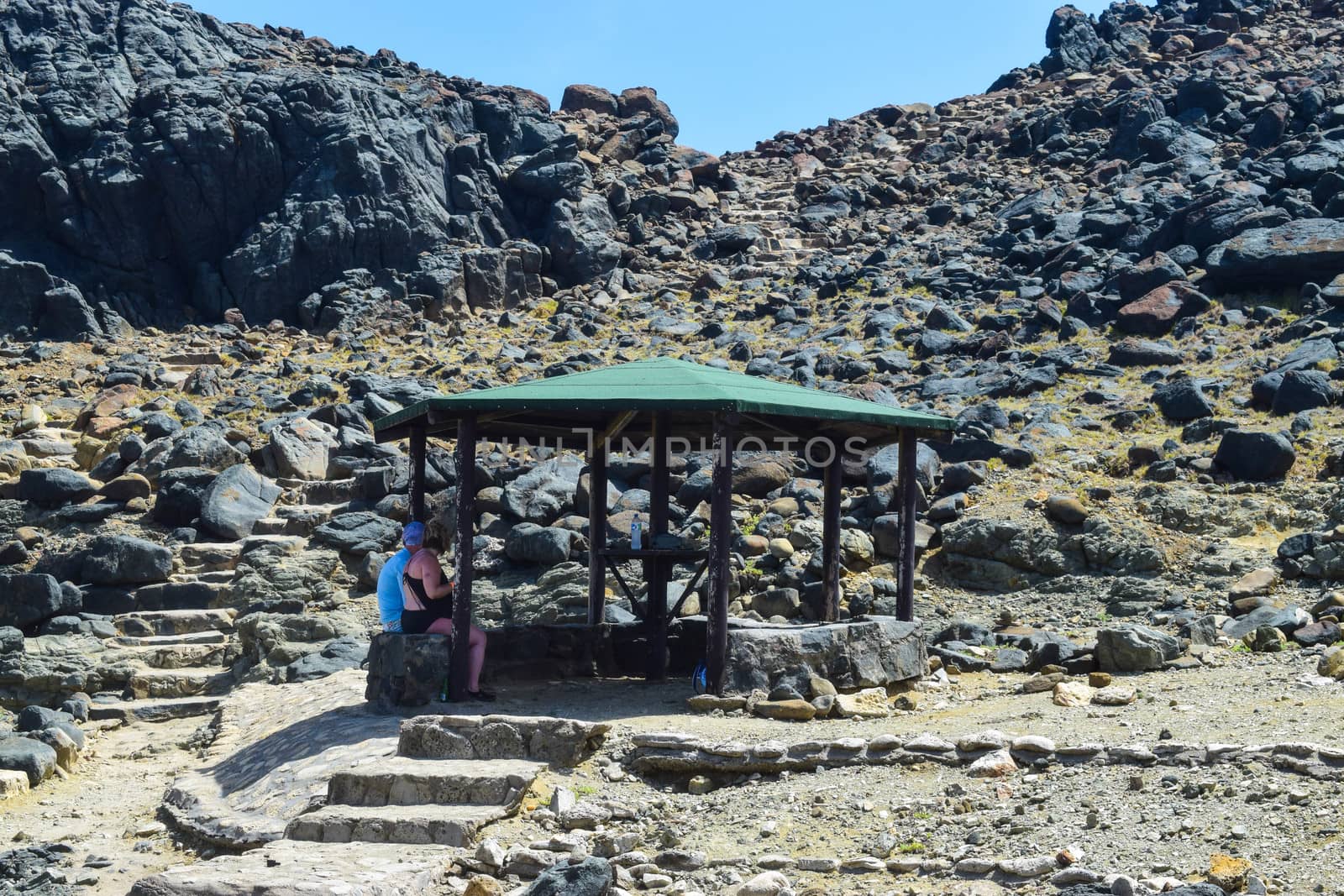 Arikok Natural Park on the island of Aruba in the Caribbean Sea with deserts and ocean waves on the rocky coast