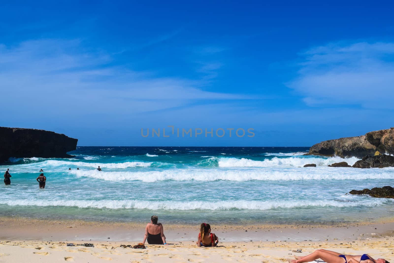 Arikok Natural Park on the island of Aruba in the Caribbean Sea with deserts and ocean waves on the rocky coast